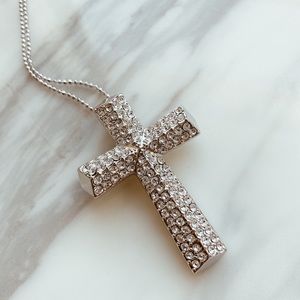 Large cross pendent with extra long chain